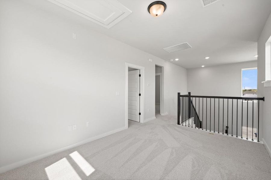 Spacious, unfurnished interior of a new home in Terrace Collection At Turner's Crossing, Buda (Image 32).