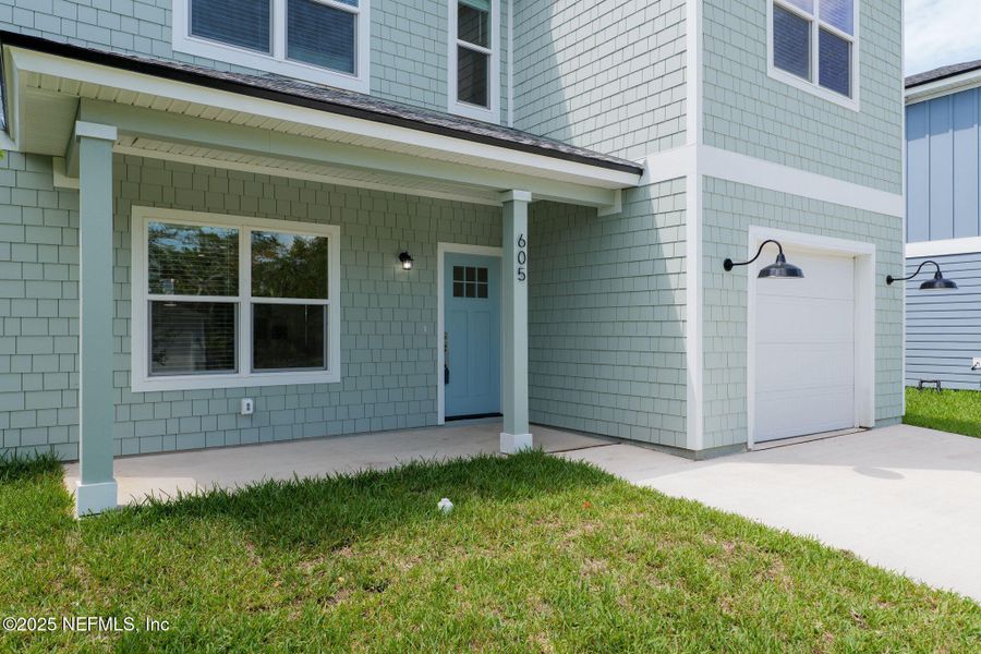 Front exterior of a new home in , St. Augustine, FL, highlighting curb appeal (Image 20).