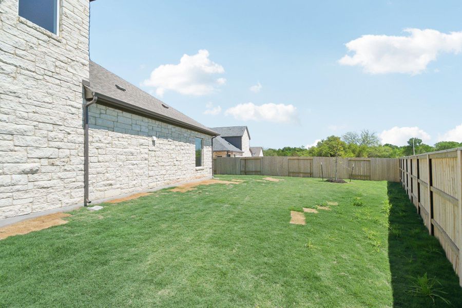 Exterior details and patio area of a home in Persimmon, Buda (Image 3).
