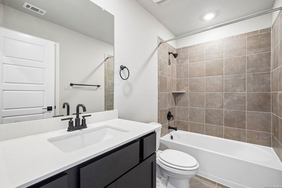 Furnished interior view inside a new home in , San Antonio (Image 34).