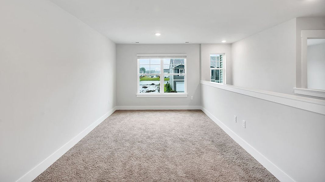 Spacious, unfurnished interior of a new home in The Landing at Sidbury Station, Castle Hayne (Image 23).