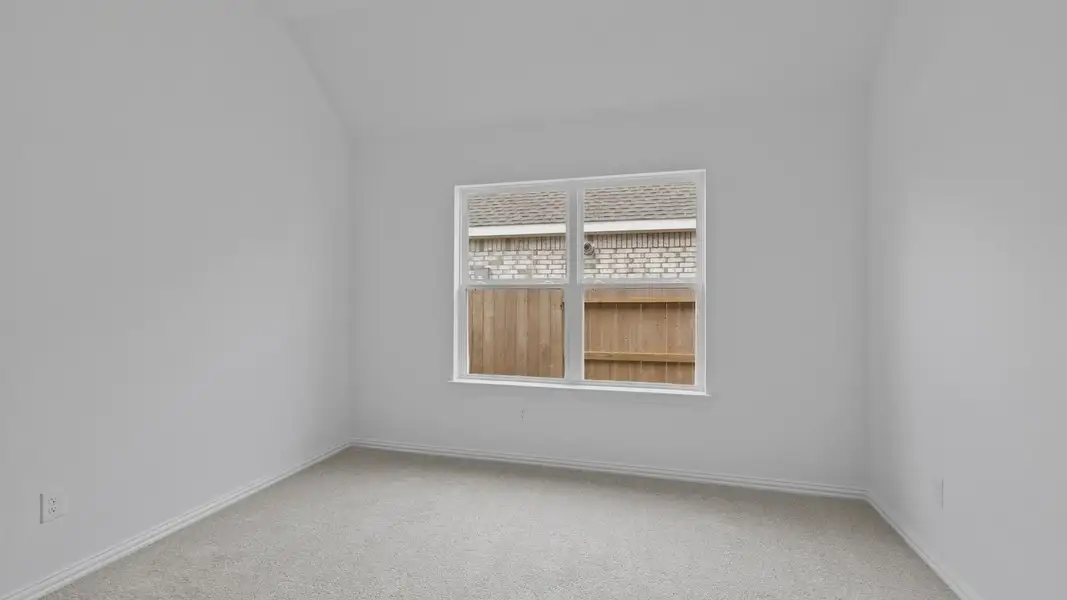 Furnished interior view inside a new home in Sunterra, Katy (Image 8).