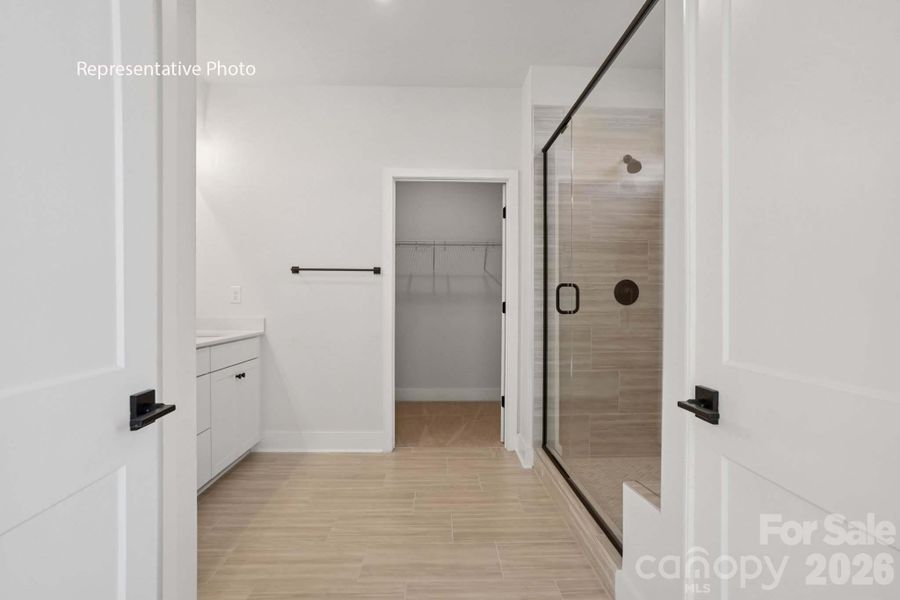 Spacious, unfurnished interior of a new home in Sanctuary at Southgate, Indian Trail (Image 30).