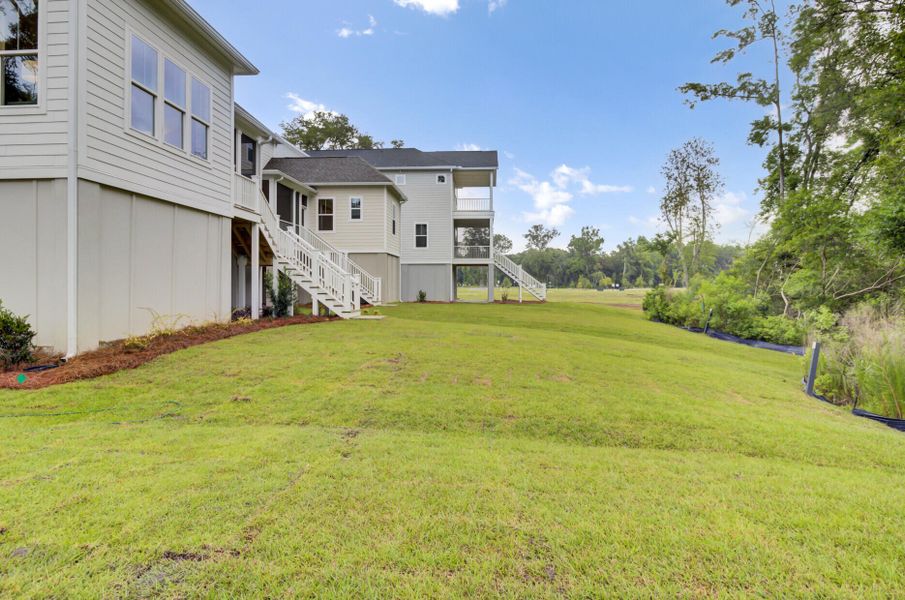 Front exterior of a new home in , Johns Island, SC, highlighting curb appeal (Image 2). Front exterior of a new home in , Johns Island, SC, highlighting curb appeal (Image 2).