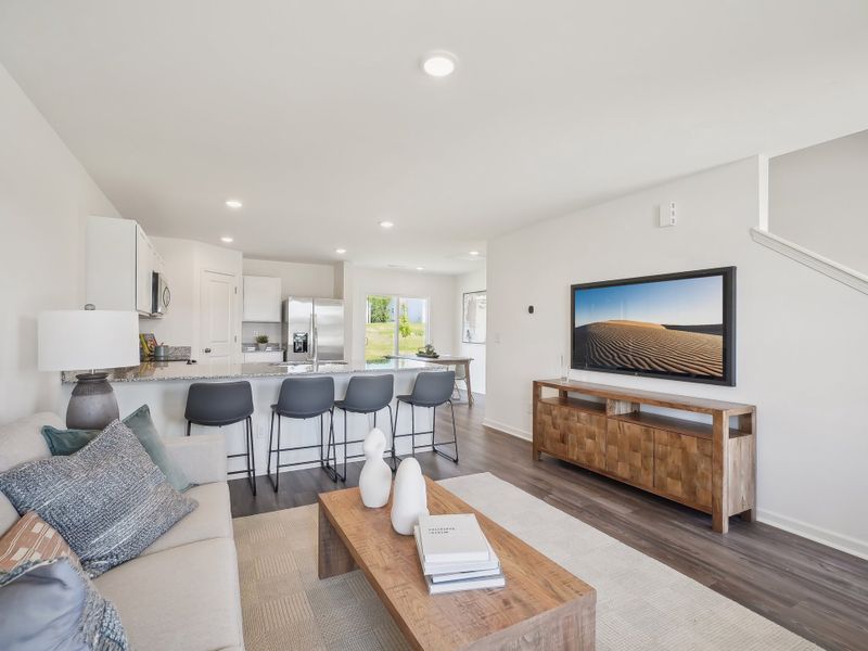 A living room with a tv and couches.