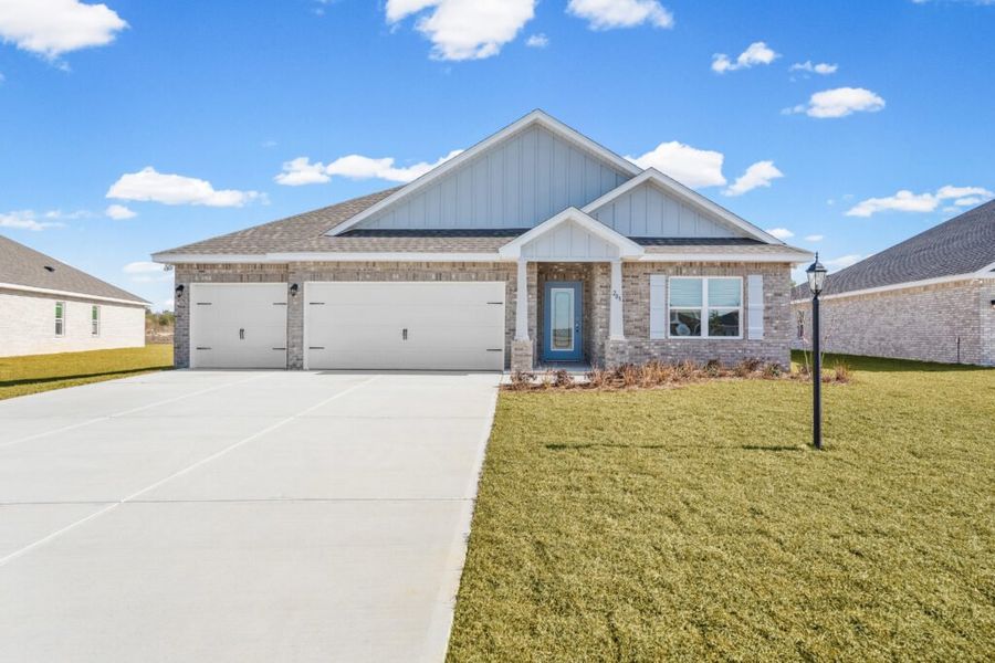 Front exterior of a new home in Lake Merial, Panama City, FL, highlighting curb appeal (Image 1). Front exterior of a new home in Lake Merial, Panama City, FL, highlighting curb appeal (Image 1).
