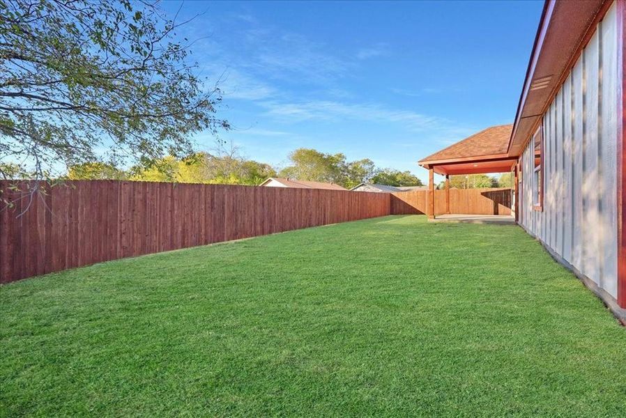 Exterior details and patio area of a home in , White Settlement (Image 3).