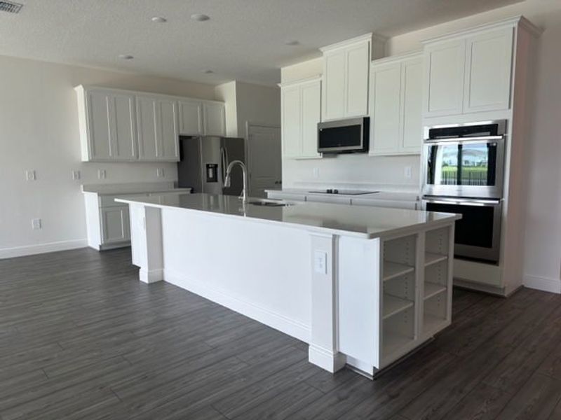 Furnished interior view inside a new home in Central Park, Port St. Lucie (Image 3).