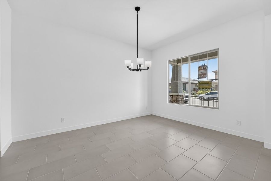 Spacious, unfurnished interior of a new home in Ellsworth Ranch, Queen Creek (Image 27).