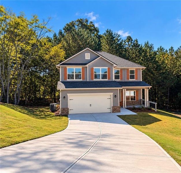 Front exterior of a new home in Magnolia Villas, Cornelia, GA, highlighting curb appeal (Image 22).