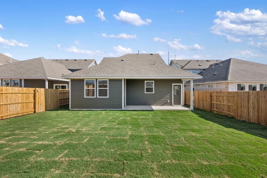 Exterior details and patio area of a home in Patterson Ranch, Georgetown (Image 29).