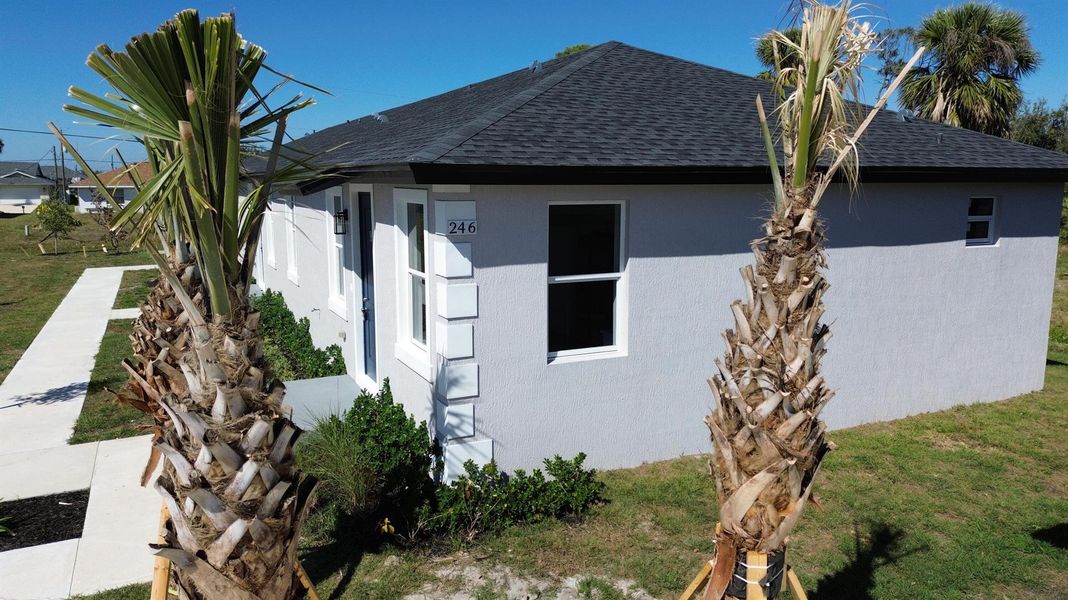 Front exterior of a new home in , Rotonda West, FL, highlighting curb appeal (Image 25).
