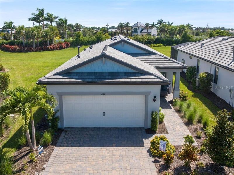 Front exterior of a new home in , Nokomis, FL, highlighting curb appeal (Image 26).