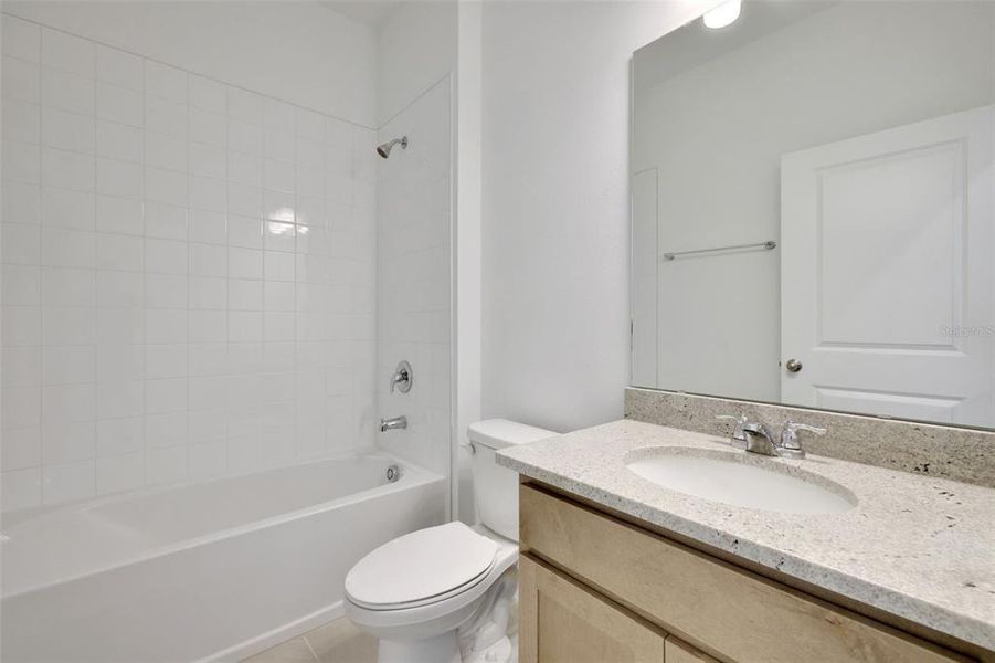 Furnished interior view inside a new home in Seaport Village, Tavares (Image 9).