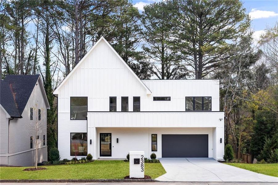 Front exterior of a new home in , Brookhaven, GA, highlighting curb appeal (Image 1). Front exterior of a new home in , Brookhaven, GA, highlighting curb appeal (Image 1).