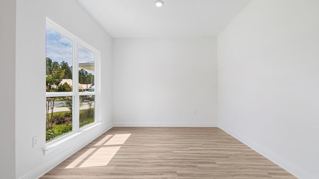 Representative unfurnished interior of a home built from the Carol by D.R. Horton in Holley Grove at Peach Creek, Santa Rosa Beach (Image 5).