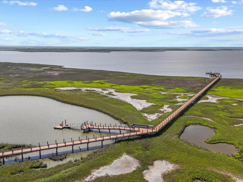 Seahorse Estates isn’t just beachfront — it’s bayfront, too. This private, lighted boardwalk leads residents directly into the Drum Bay Nature Preserve, where fishing, crabbing, and kayaking are daily rituals. It’s a rare opportunity to live where nature and luxury coexist.