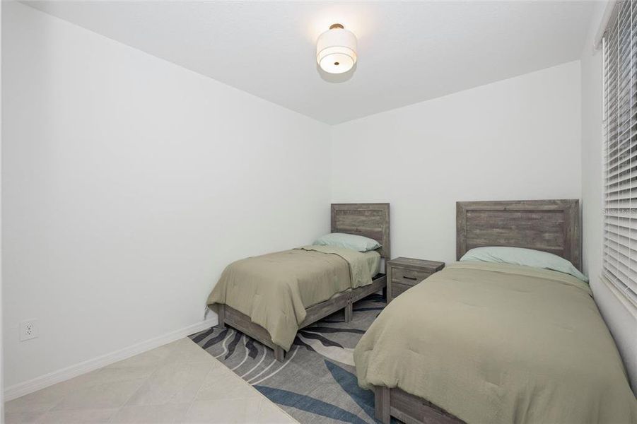 Furnished interior view inside a new home in Wellen Park Golf & Country Club, Venice (Image 17).