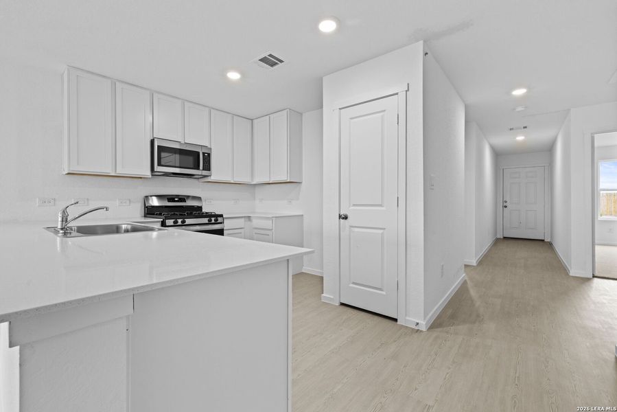 Furnished interior view inside a new home in Spring Grove, St. Hedwig (Image 3).