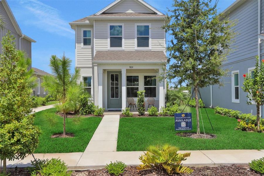 Front exterior of a new home in Bungalow Walk at Lakewood Ranch, Sarasota, FL, highlighting curb appeal (Image 20).