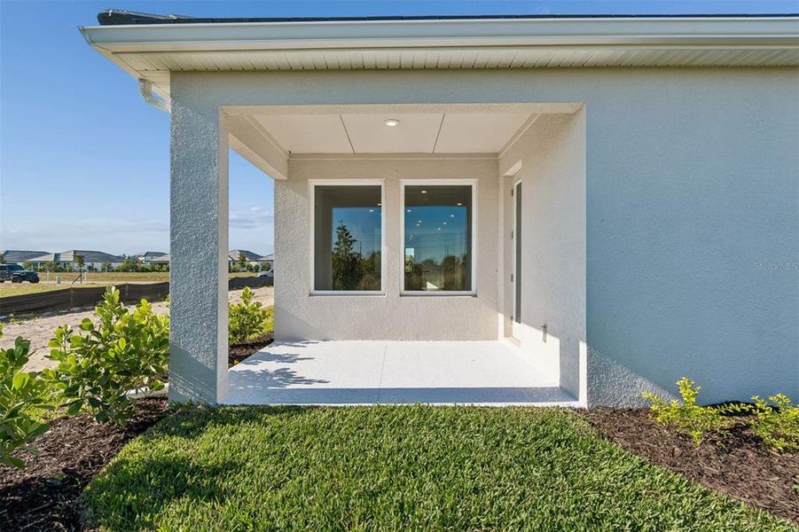 Exterior details and patio area of a home in Vistera of Venice – Garden Series, Nokomis (Image 3).