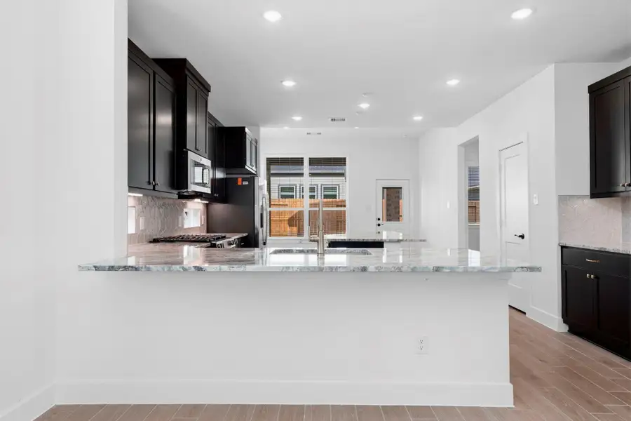 Furnished interior view inside a new home in Emory Glen, Magnolia (Image 6).