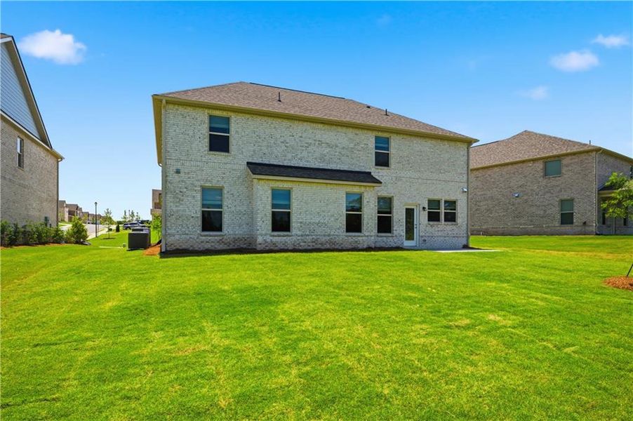 Exterior details and patio area of a home in Adagio, Dacula (Image 20).