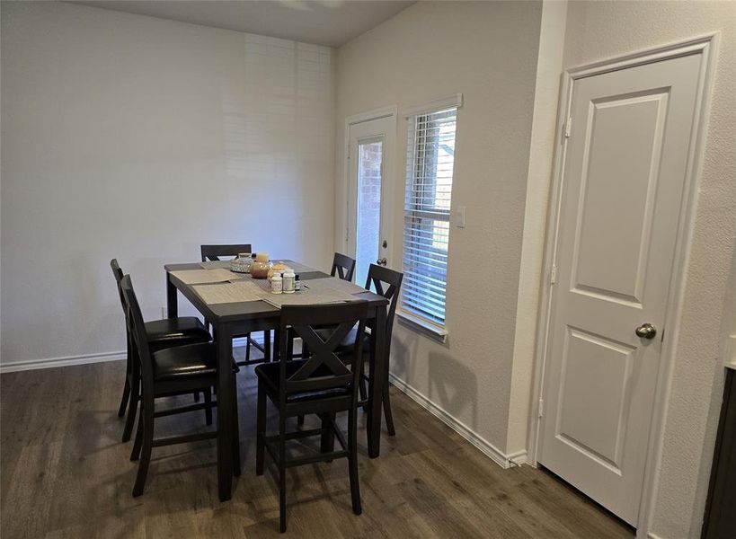 Dining area featuring dark hardwood / wood-style floors