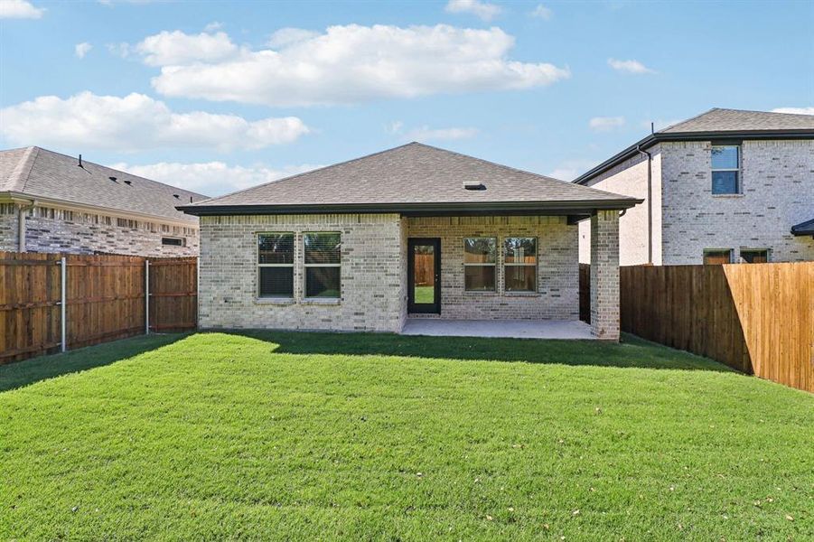 Exterior details and patio area of a home in Eastridge - Spring Series, McKinney (Image 3). Exterior details and patio area of a home in Eastridge - Spring Series, McKinney (Image 3).