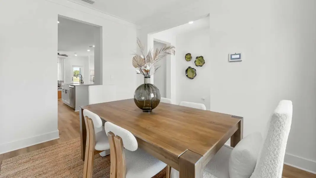 Furnished interior view inside a new home in Crest Bay Cottages, Miramar Beach (Image 6).