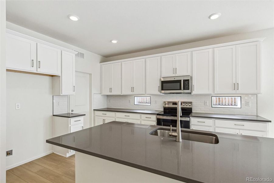 Furnished interior view inside a new home in Turnberry, Commerce City (Image 8).