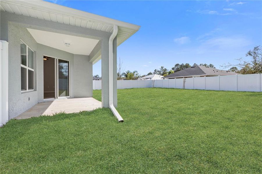 Exterior details and patio area of a home in , Palm Coast (Image 21).