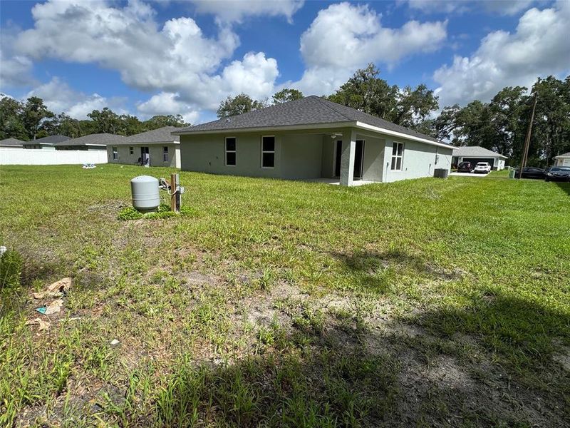 Front exterior of a new home in , Dunnellon, FL, highlighting curb appeal (Image 8).