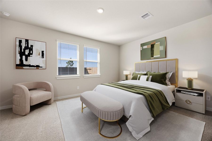 The spacious primary suite offers soft neutral tones, plush carpeting, and large windows that fill the room with natural light. This serene retreat provides the perfect balance of comfort and style, creating an ideal space to unwind at the end of the day.