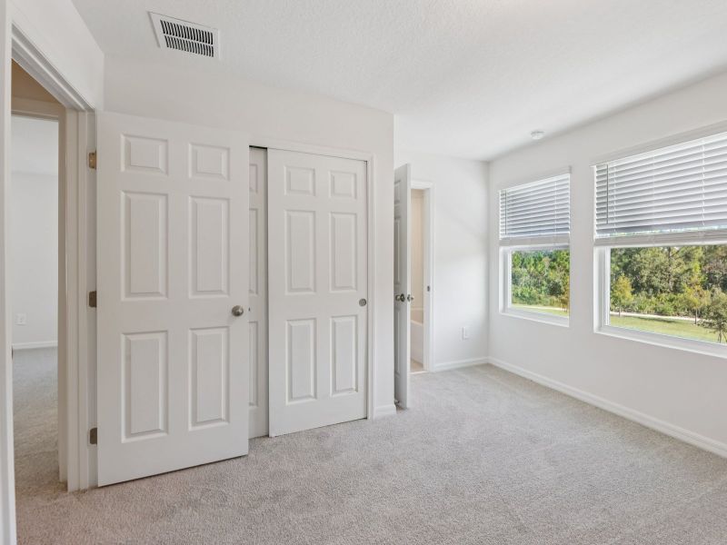 Spacious, unfurnished interior of a new home in The Meadow at Crossprairie Townes, St. Cloud (Image 12).