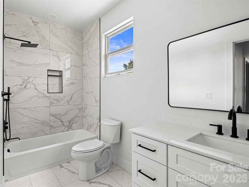 BATHROOM WITH BATH/SHOWER COMBO