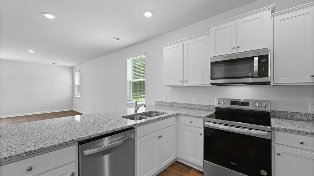 Furnished interior view inside a new home in Pine Hills at Cane Bay, Summerville (Image 3). Furnished interior view inside a new home in Pine Hills at Cane Bay, Summerville (Image 3).