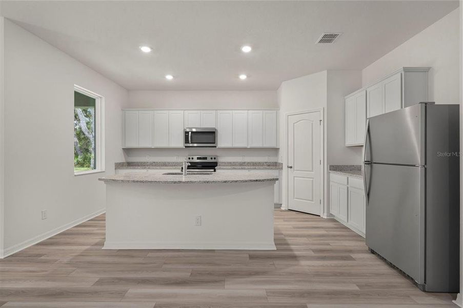 Furnished interior view inside a new home in Poinciana, Poinciana (Image 9).