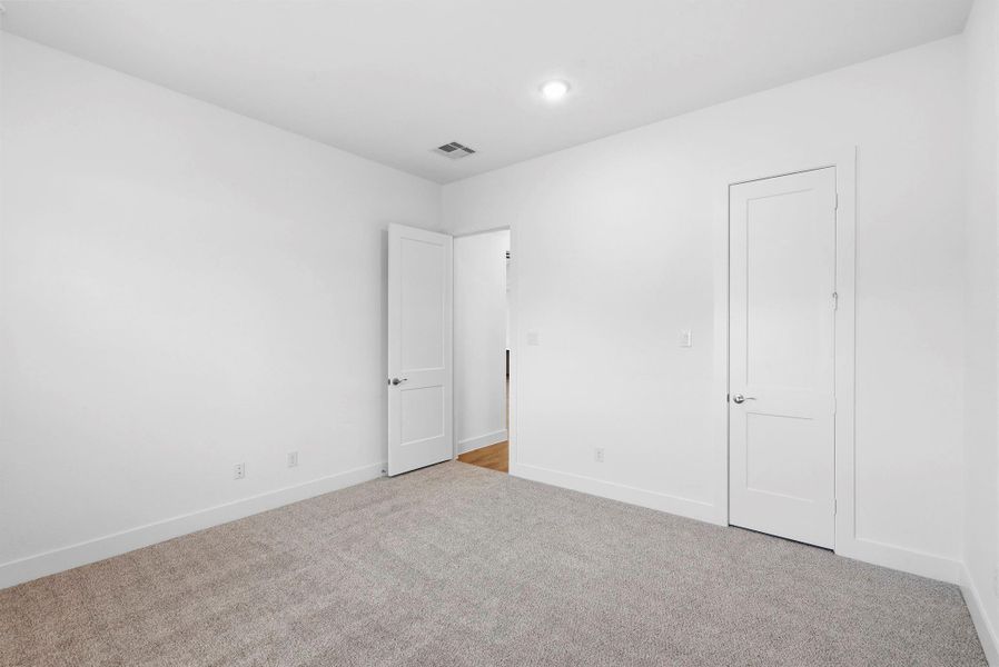 Spacious, unfurnished interior of a new home in Meridiana, Manvel (Image 24).