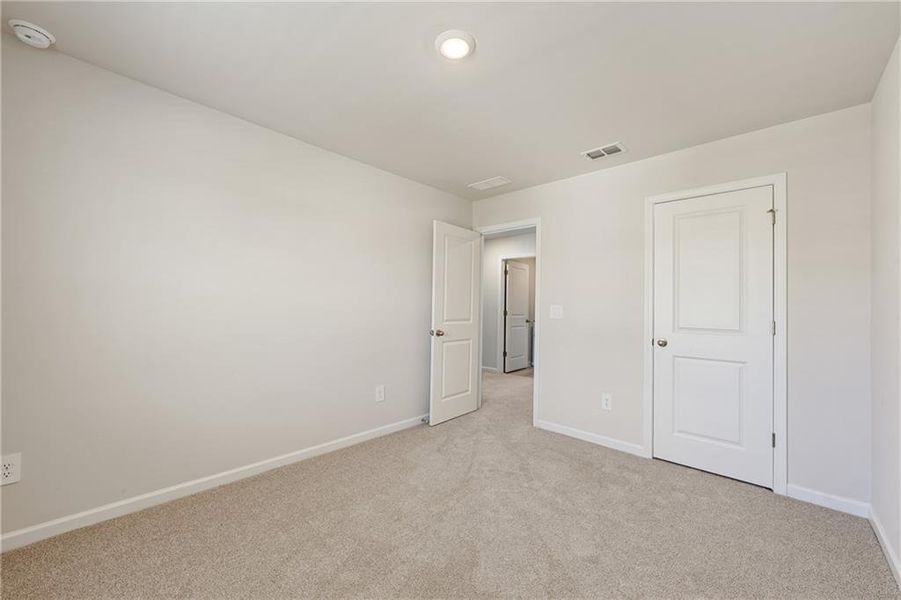 Spacious, unfurnished interior of a new home in Creekside at Oxford Park, Fairburn (Image 34).