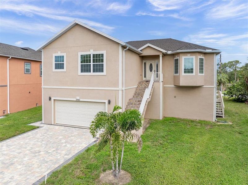 Front exterior of a new home in , Tarpon Springs, FL, highlighting curb appeal (Image 2). Front exterior of a new home in , Tarpon Springs, FL, highlighting curb appeal (Image 2).