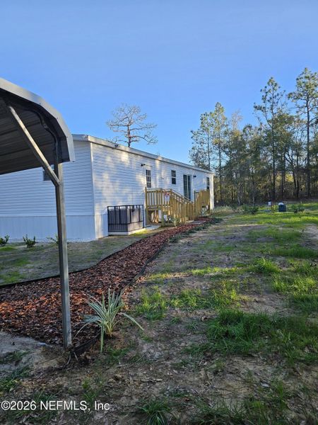 Exterior details and patio area of a home in , Hawthorne (Image 8).