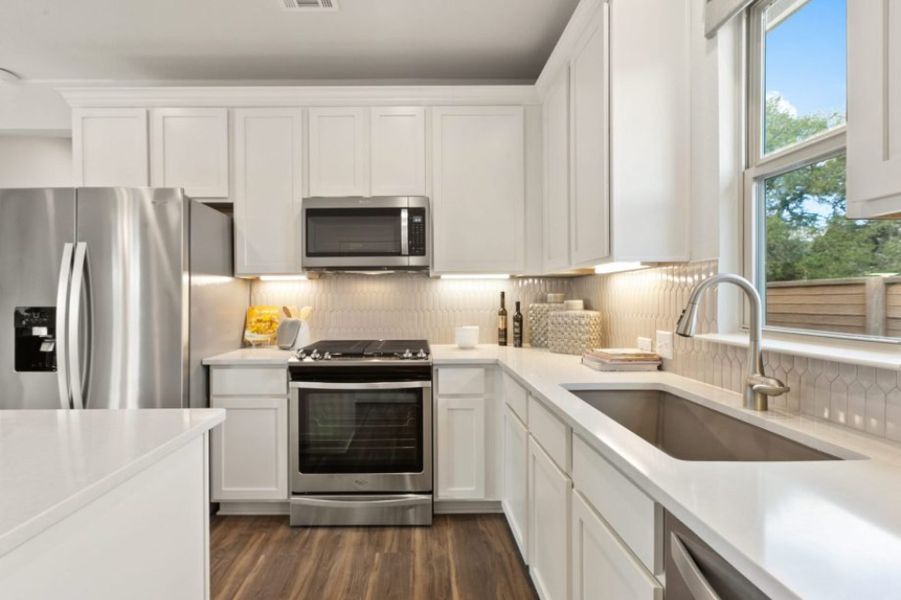 Furnished interior view inside a new home in Whisper Valley, Manor (Image 5).