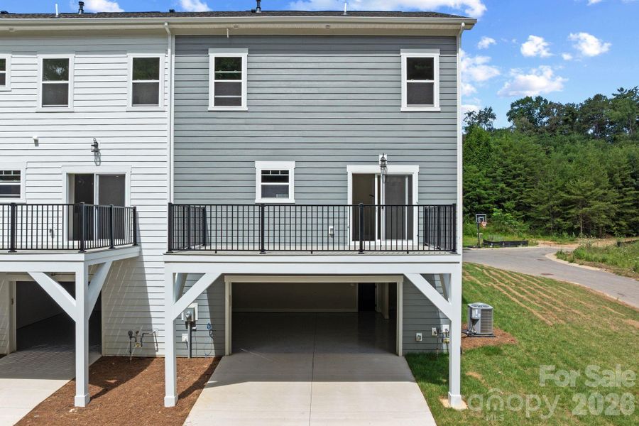 Exterior details and patio area of a home in , Asheville (Image 26).
