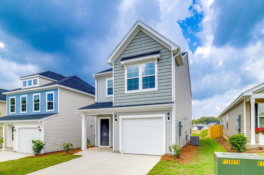 Front exterior of a new home in Bluefield, Lexington, SC, highlighting curb appeal (Image 2). Front exterior of a new home in Bluefield, Lexington, SC, highlighting curb appeal (Image 2).