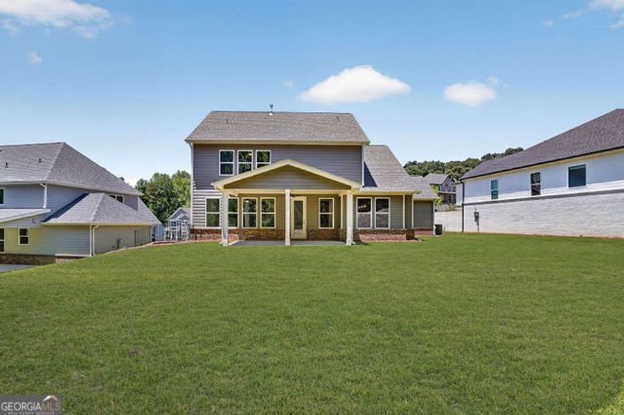 Exterior details and patio area of a home in The Manor at Gainesville Township, Gainesville (Image 20).
