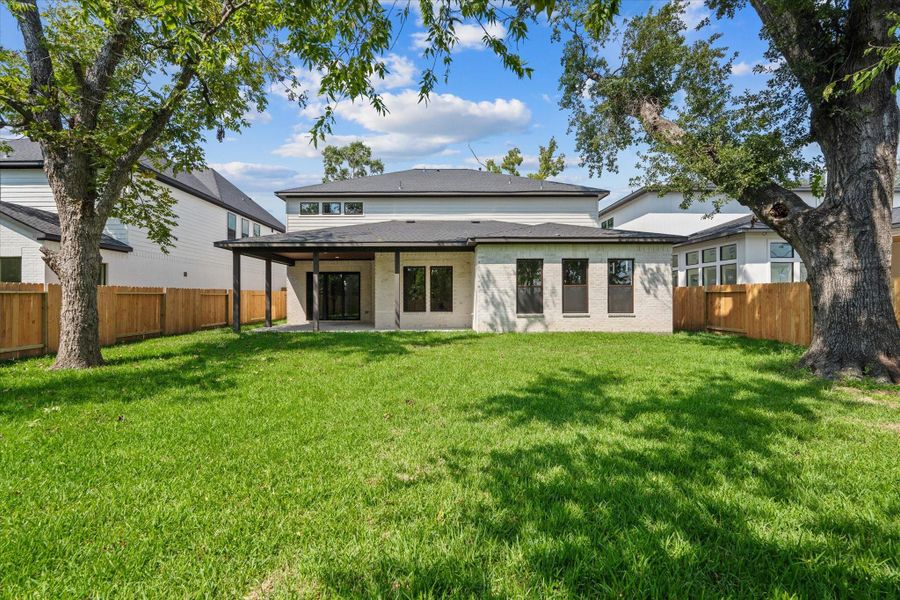 Front exterior of a new home in , Houston, TX, highlighting curb appeal (Image 25).