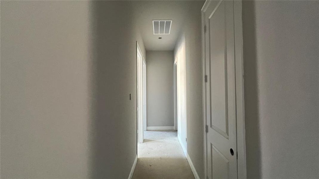 Hallway leading to Bedrooms 2 and 3