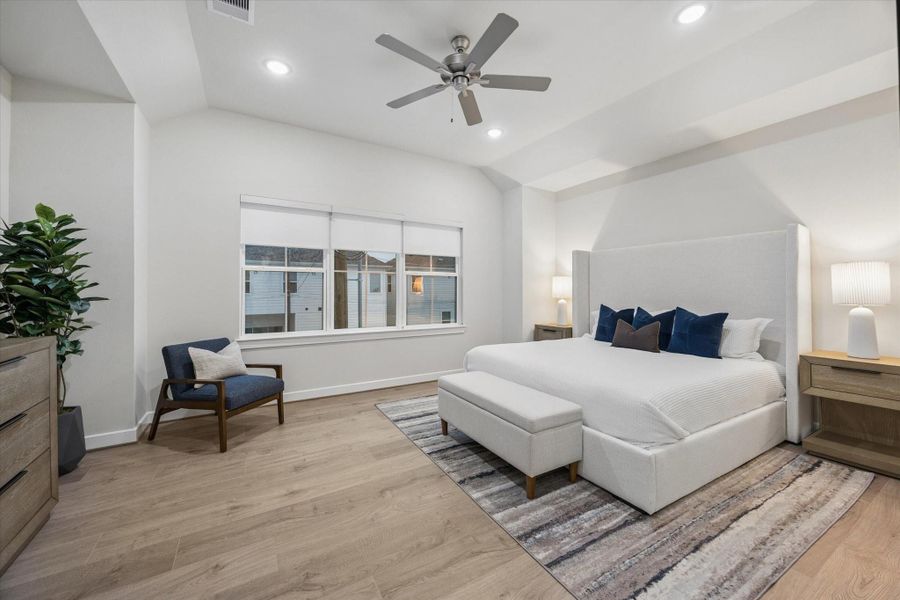 Primary bedroom, no carpet, wide and tall windows for natural light, window treatments are available. Photo is of model at 6340, finishes are similar. Primary bedroom, no carpet, wide and tall windows for natural light, window treatments are available. Photo is of model at 6340, finishes are similar.