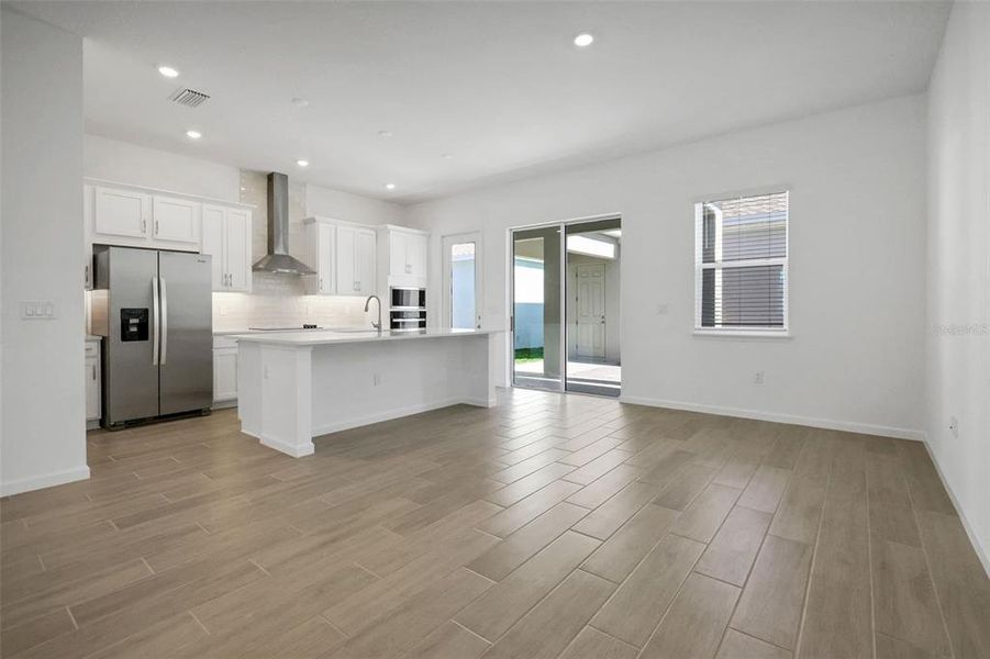 Spacious, unfurnished interior of a new home in Serenade at Ovation, Winter Garden (Image 15).